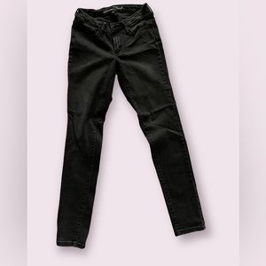 Womens black jeggings, size 4